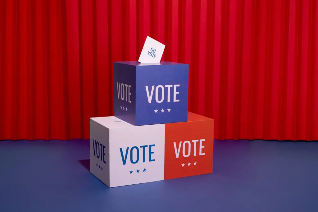 Urnes de vote bleues et blanches avec le mot "VOTE" pour le renouvellement du mandat CSE.