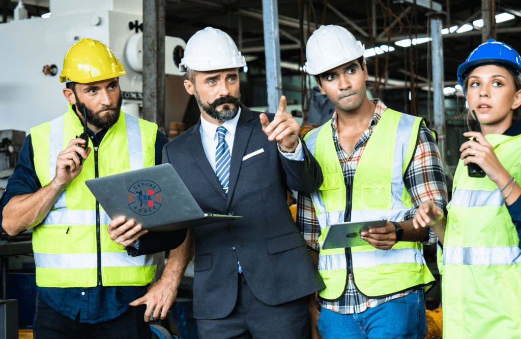 Visite d'inspection SSCT du CSE : équipe discute devant un ordinateur